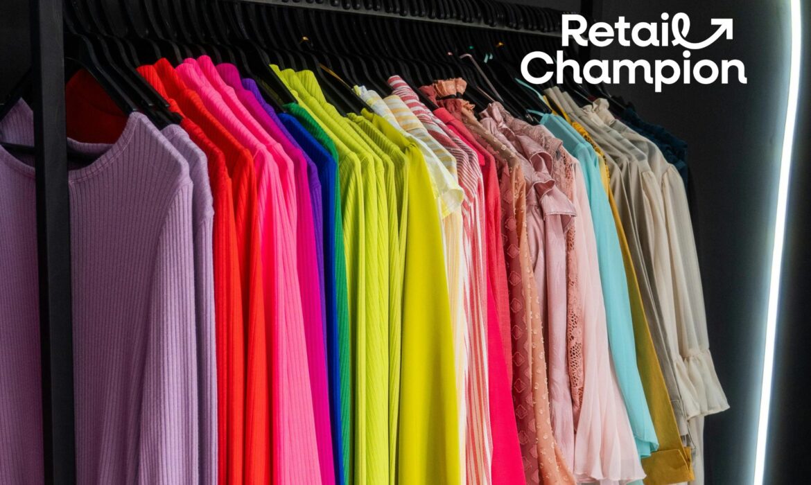 Colourful clothes on a rail in boutique