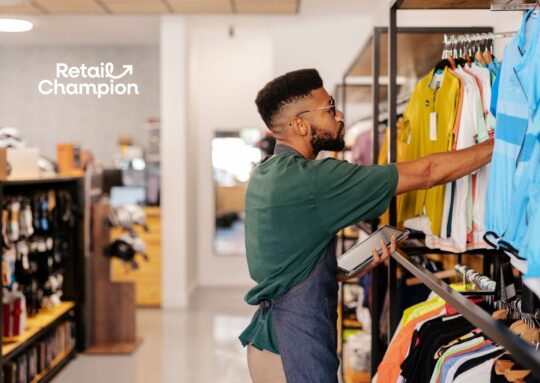 Retail Worker with ipad checking stock