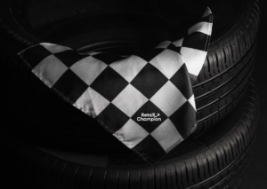 Race tyres and checkered flag