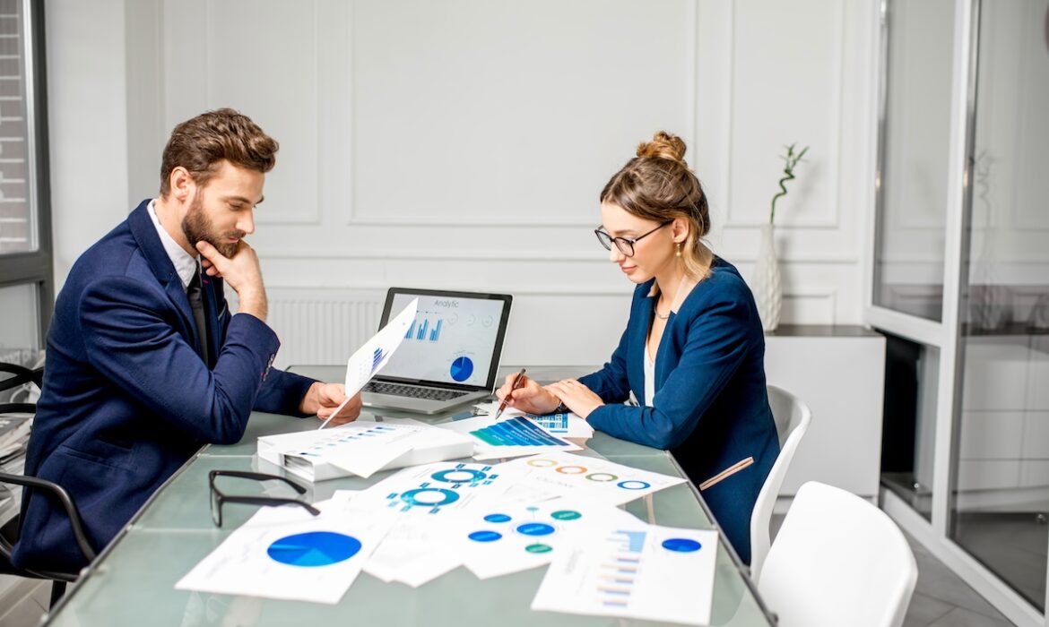 A business team reviewing customer insights to inform commercial decisions.